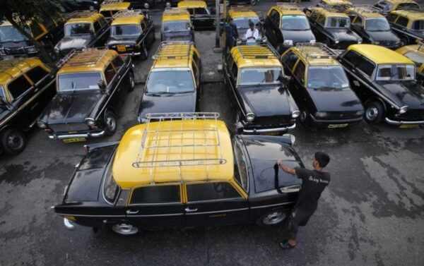 black and yellow Padmini taxis 2