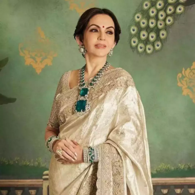 Nita ambani gold sari and jewellery collection 5