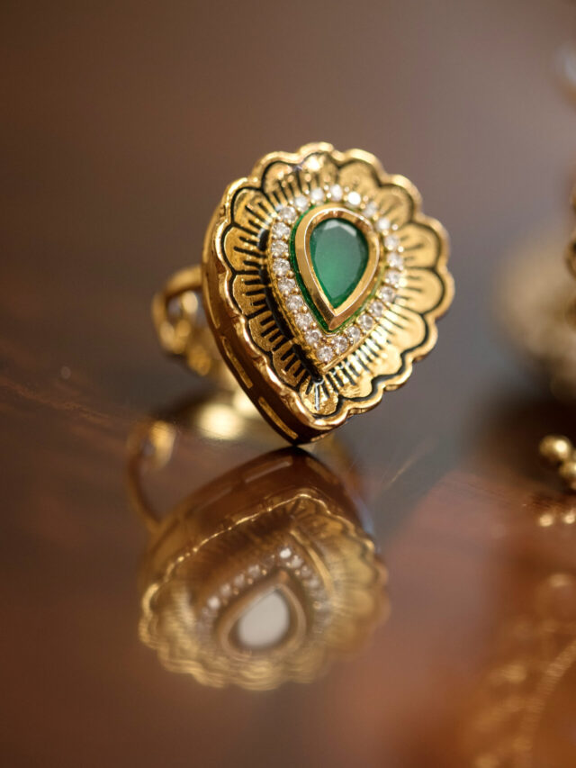 Golden ring with green stone and indian bracelets